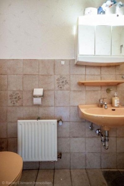 Emmerich am Rhein Emmerich-Hüthum: Viel Potenzial - Reihenmittelhaus mit sonnigem Garten Haus kaufen