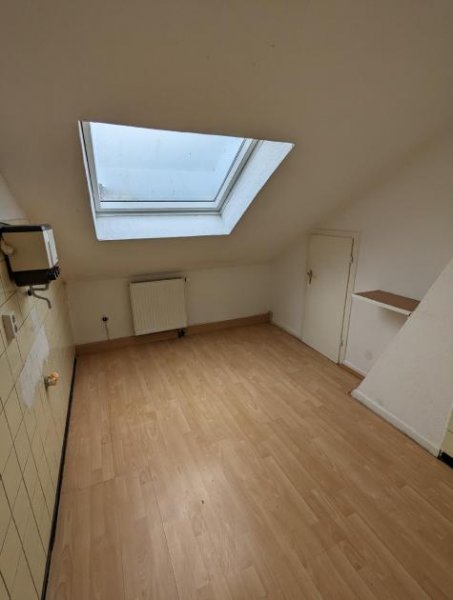 Rheinberg Rheinberg - Dachgeschosswohnung, vermietet Wohnung kaufen
