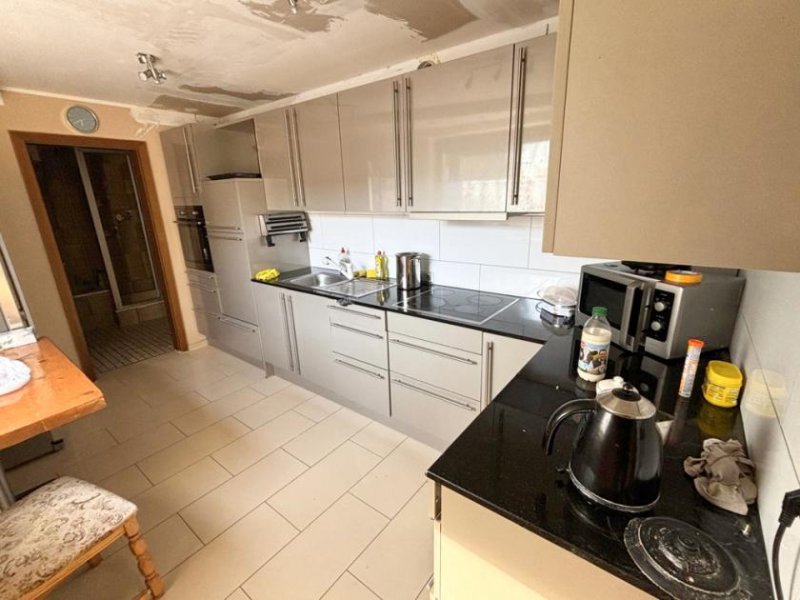 Osnabrück Doppelhaushälfte mit 2 Wohneinheiten und Garagen in Osnabrück-Eversburg Haus kaufen