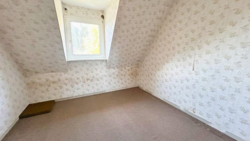 Emlichheim Doppelhaushälfte mit Potenzial, zahlreichen Nutzungsmöglichkeiten und vielfältigen Nebengebäuden Haus kaufen