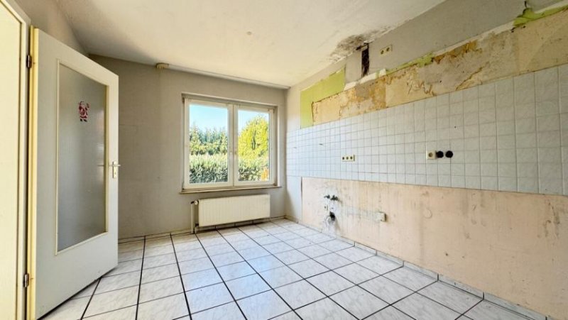 Neuenhaus Einfamilienhaus mit Einliegerwohnung in Neuenhaus; + Baugrundstück-Potenzial Haus kaufen