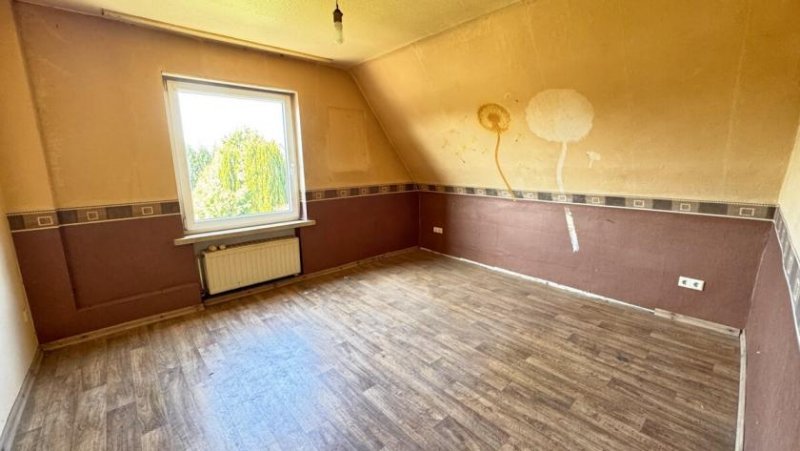 Neuenhaus Einfamilienhaus mit Einliegerwohnung in Neuenhaus; + Baugrundstück-Potenzial Haus kaufen