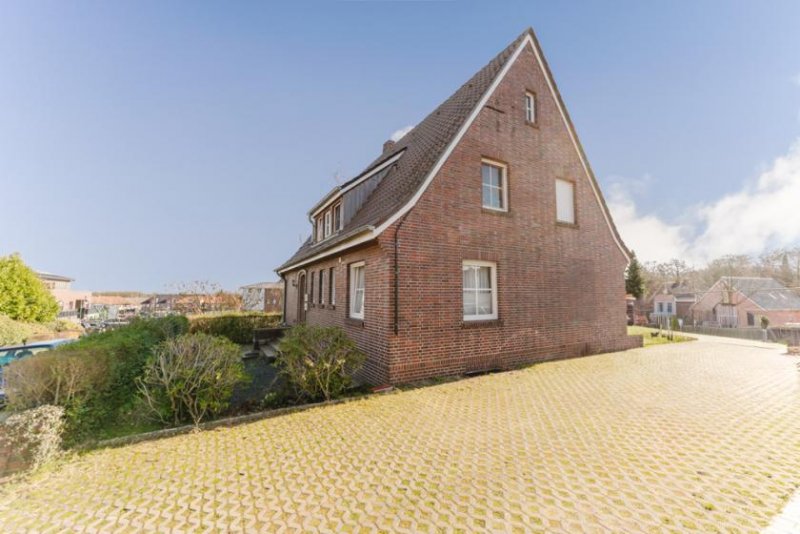 Uelsen Kapitalanlage in Toplage von Uelsen – Vermietetes Einfamilienhaus mit Einliegerwohnung Haus kaufen