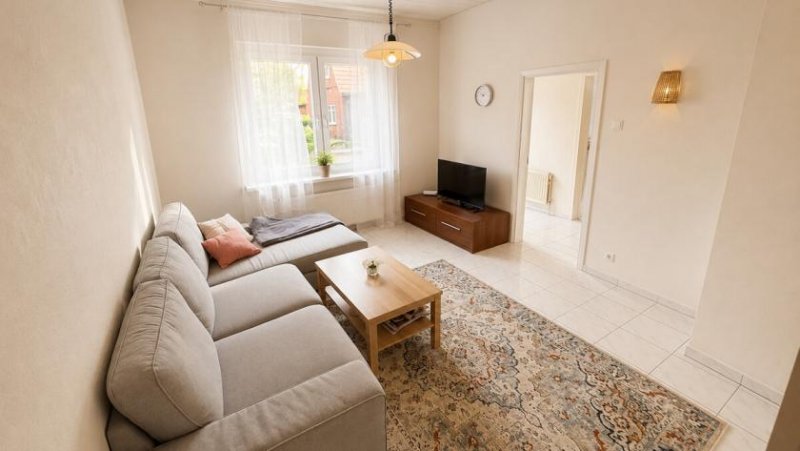 Uelsen Zwei Wohneinheiten, viele Möglichkeiten – gepflegtes Zweifamilienhaus in Uelsen Haus kaufen