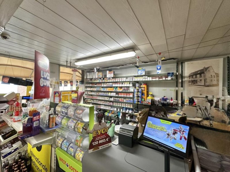 Kerpen CITYHOUSE: Ohne Käuferprovision! Wohn- und Geschäftshaus mit Postfiliale, Western Union & Kiosk! Haus kaufen