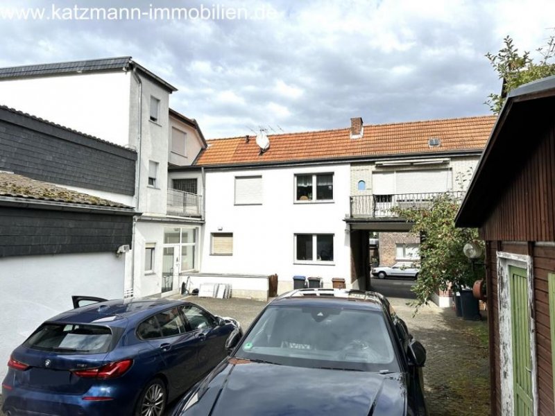 Hürth Wohn- und Geschäftshaus + Garagen + 1.186 m² großes Grundstück zu verkaufen Haus kaufen