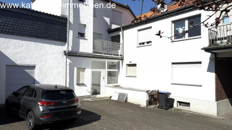 Hürth Wohn- und Geschäftshaus + Garagen + 1.186 m² großes Grundstück zu verkaufen Haus kaufen