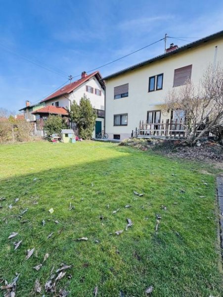 Braunau am Inn Attraktives Zweifamilienhaus mit zwei vermieteten Wohnungen und neuer Luftwärmepumpe Haus kaufen