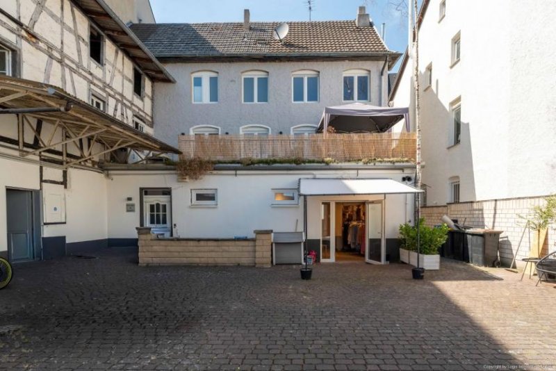 Bad Neuenahr-Ahrweiler Value-Add-Investment: Historisches Wohn- und Geschäftshaus mit Ausbaupotenzial in 1A-Innenstadtlage Haus kaufen