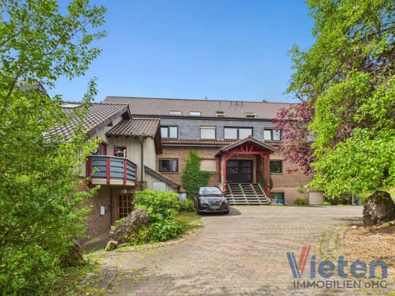 Schleiden Wohnensemble mit 22 Wohneinheiten in 2 Mehrfamilienhäusern in Schleiden-Broich - BJ ca. 1950 - 2003 Gewerbe kaufen