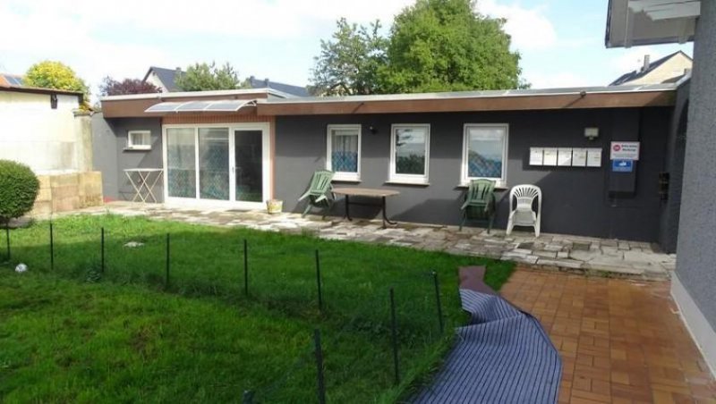 Heddert Heddert - Mehrfamilienhaus mit 6 Wohneinheiten auf großem Grundstück und Wintergarten Haus kaufen