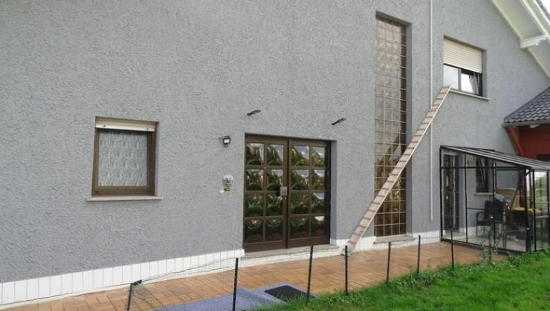 Heddert Heddert - Mehrfamilienhaus mit 6 Wohneinheiten auf großem Grundstück und Wintergarten Haus kaufen