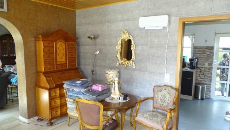 Heddert Heddert - Mehrfamilienhaus mit 6 Wohneinheiten auf großem Grundstück und Wintergarten Haus kaufen