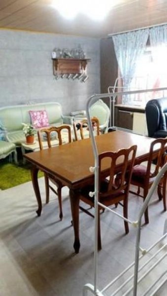 Heddert Heddert - Mehrfamilienhaus mit 6 Wohneinheiten auf großem Grundstück und Wintergarten Haus kaufen