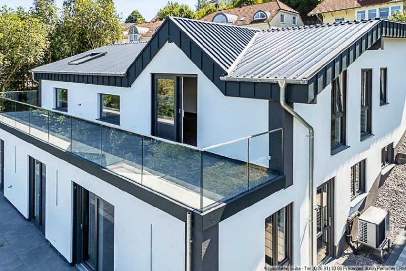 Daun Erstbezug: Moderne Neubau-Erdgeschoss-Eigentumswohnung mit 2 Garagen in Daun-Pützborn Wohnung kaufen