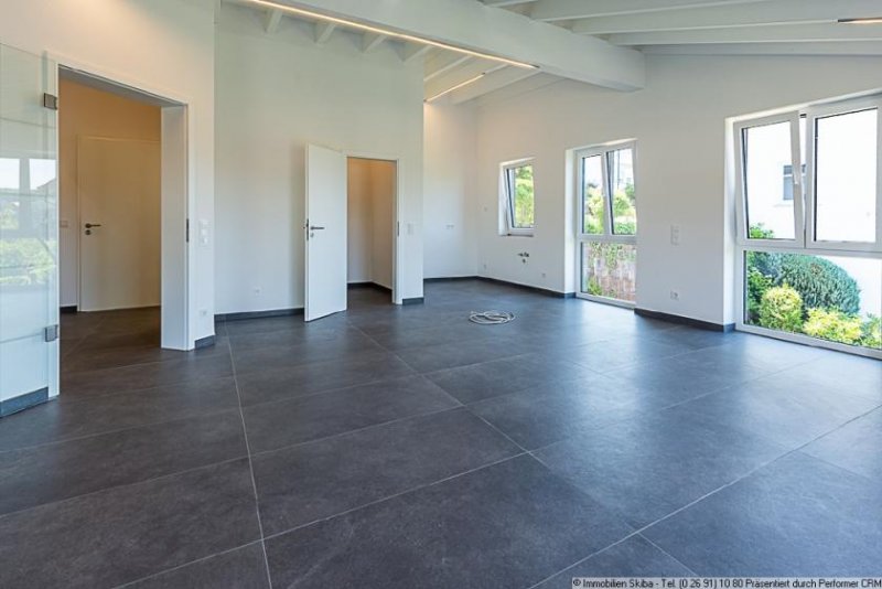 Daun Erstbezug: Moderne Neubau-Erdgeschoss-Eigentumswohnung mit 2 Garagen in Daun-Pützborn Wohnung kaufen