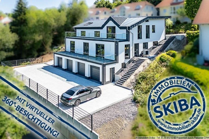 Daun Erstbezug: Moderne Neubau-Erdgeschoss-Eigentumswohnung mit 2 Garagen in Daun-Pützborn Wohnung kaufen