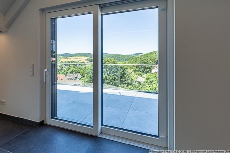 Daun Erstbezug: Moderne Neubau-Erdgeschoss-Eigentumswohnung mit 2 Garagen in Daun-Pützborn Wohnung kaufen