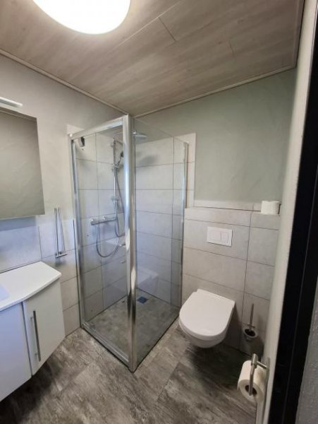 Beuren Eifel / Wohnhaus (75qm) mit Fernsicht, Halle (230qm) und Garagen (45qm) im ruhigen Gewerbegebiet -Top Lage- Haus kaufen