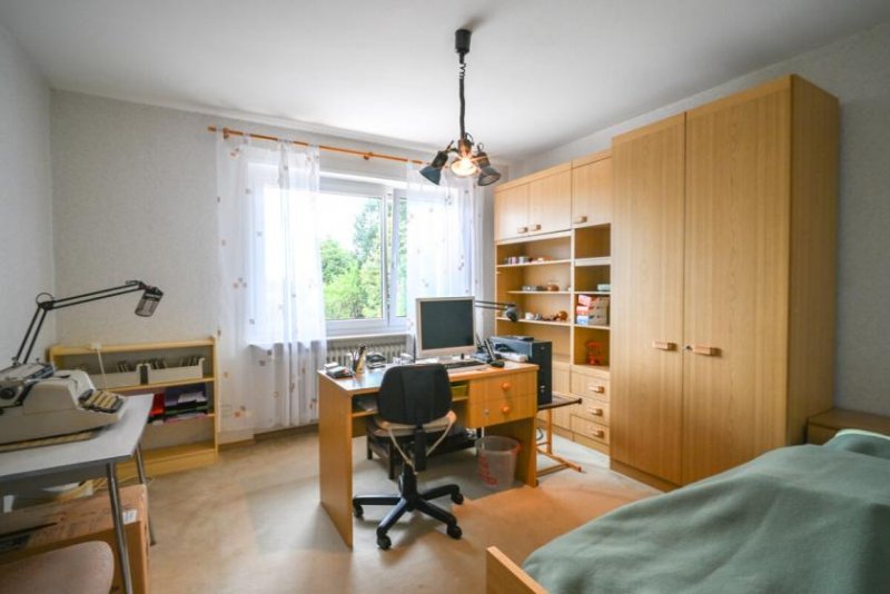 Großostheim DIETZ: Gepflegter Bungalow in direkter Feldrandlage mit Keller, Garage und viel Platz in Ringheim! Haus kaufen