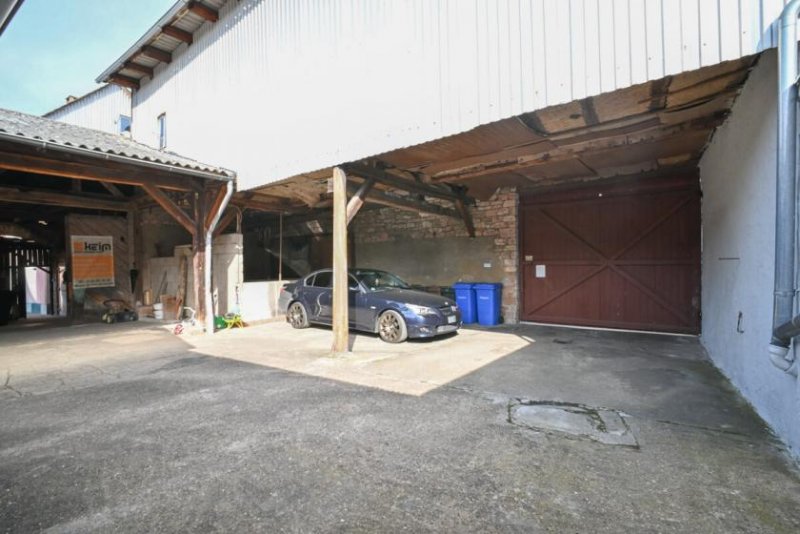 Großostheim DIETZ: Vermietetes (362qm) Wohn- & Geschäftshaus: 4 Wohneinheiten, 2 Ladenlokale & Gewölbekeller! Haus kaufen