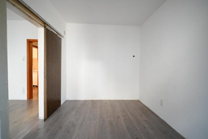 Pfungstadt DIETZ: REDUZIERT! Freistehendes Einfamilienhaus mit DO-Garage inmitten von Pfungstadt! Haus kaufen