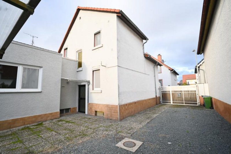Pfungstadt DIETZ: REDUZIERT! Freistehendes Einfamilienhaus mit DO-Garage inmitten von Pfungstadt! Haus kaufen