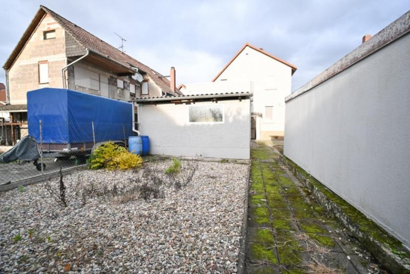 Pfungstadt DIETZ: REDUZIERT! Freistehendes Einfamilienhaus mit DO-Garage inmitten von Pfungstadt! Haus kaufen