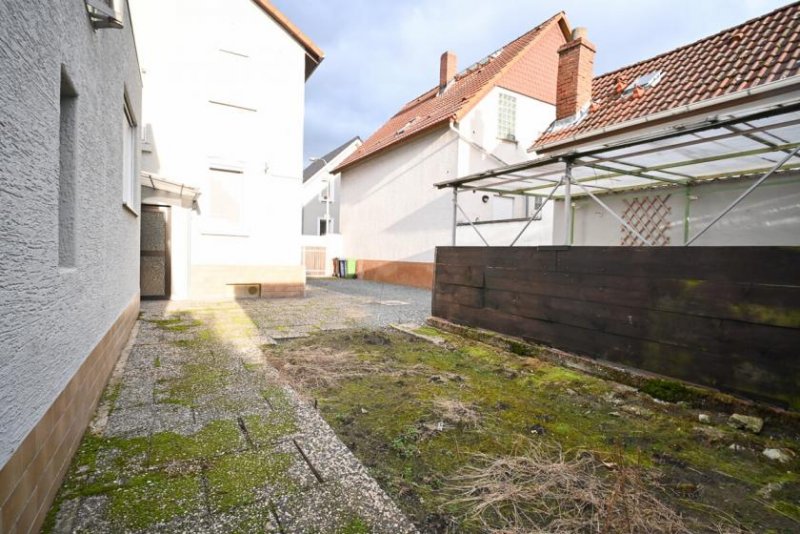 Pfungstadt DIETZ: REDUZIERT! Freistehendes Einfamilienhaus mit DO-Garage inmitten von Pfungstadt! Haus kaufen