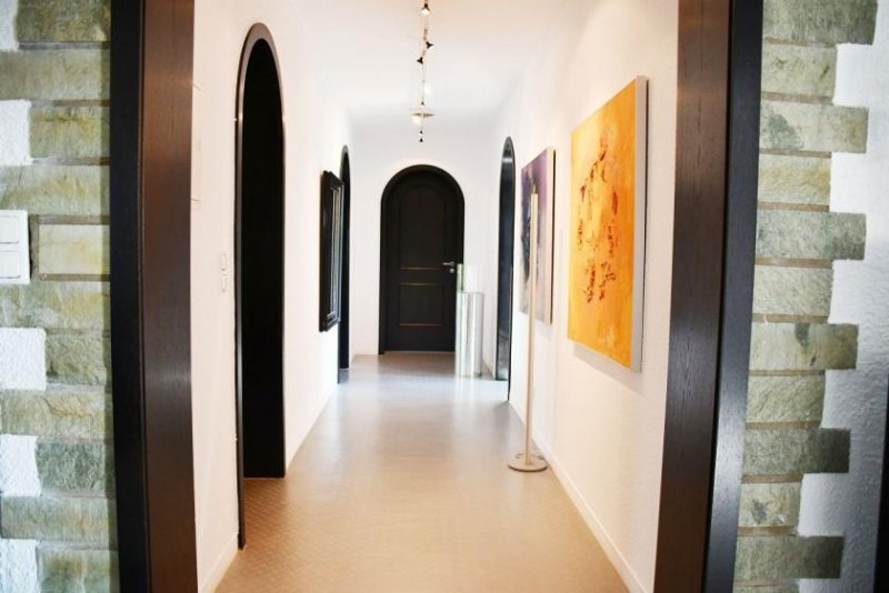 Fränkisch-Crumbach Wohnen wie im Urlaub – jeden Tag! Mediterrane Eleganz in exponierter Lage Haus kaufen