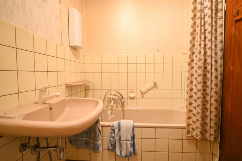 Dieburg DIETZ: REDUZIERT! Reihenmittelhaus mit Garage, Keller und Garten in beliebter Lage Dieburgs! Haus kaufen