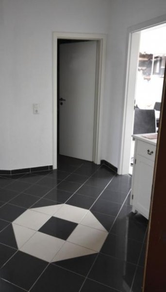 Flörsheim am Main 3- Zimmer-Eigentumswohnung im 6-Familienhaus inkl. Tiefgaragenstellplatz Wohnung kaufen