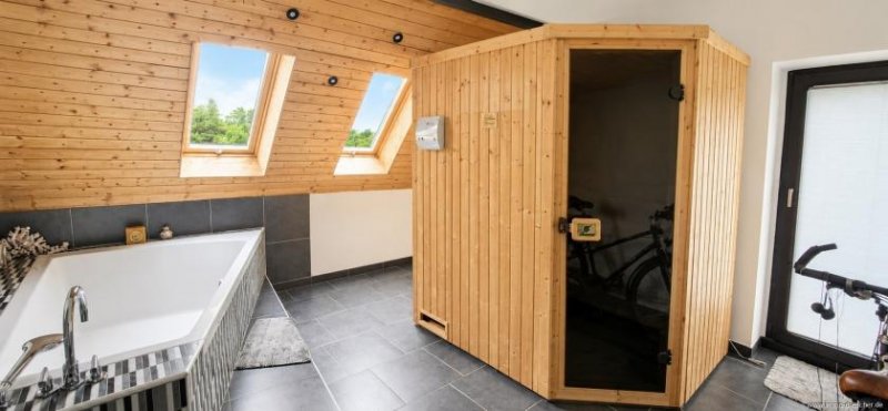 Saarbrücken Ein besonderes Zuhause in Höhenlage – mit Panoramablick, Wellnessbereich und Gartenidylle Haus kaufen