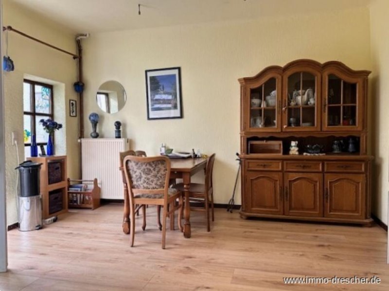 Saarbrücken Gemütliches Zweifamilienhaus mit Garten und viel Potential in Scheidt Haus kaufen