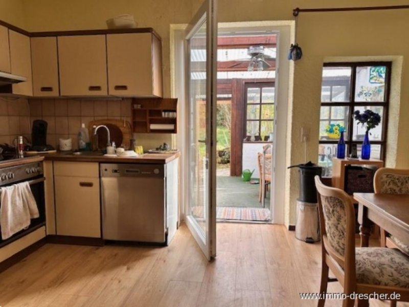 Saarbrücken Gemütliches Zweifamilienhaus mit Garten und viel Potential in Scheidt Haus kaufen