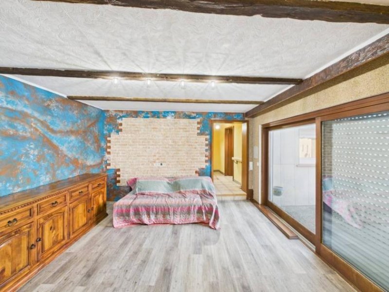 Merchweiler Einfamilienhaus in Merchweiler – modernisiert 2024, 102 m² Wohnfläche und großer Garten! Haus kaufen