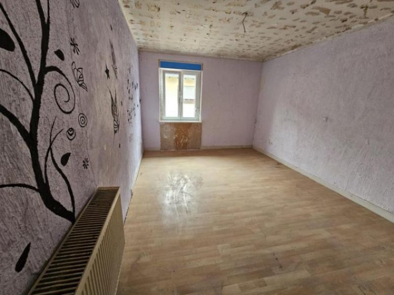 Pirmasens ObjNr:19582 - Renovierungsbedürftiges 4 Fam.-Mehrfamilienhaus in zentraler Lage Haus kaufen