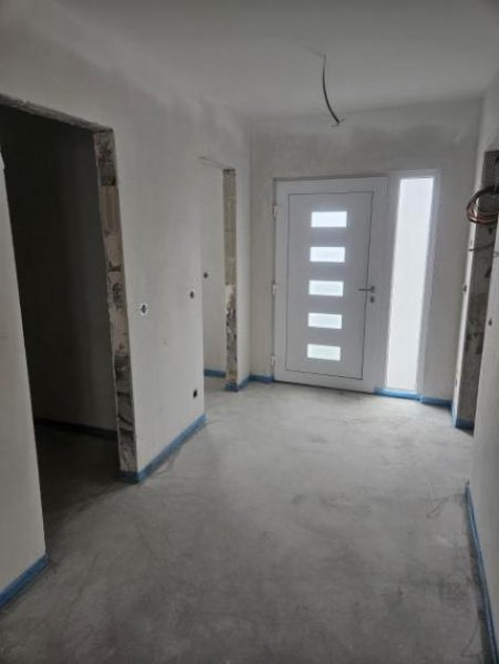 Gimbsheim ObjNr:B-19766 - Erstbezug - Neubau - geräumiges EFH als DHH mit Garten und Garage in Gimbsheim Haus kaufen