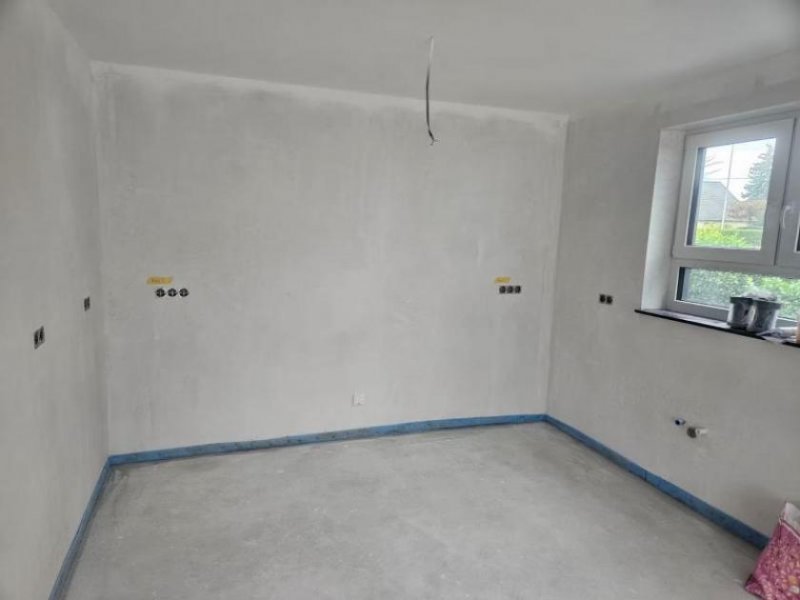 Gimbsheim ObjNr:B-19766 - Erstbezug - Neubau - geräumiges EFH als DHH mit Garten und Garage in Gimbsheim Haus kaufen