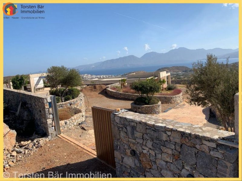 Agios Nikolaos Kreta, Ag. Nikolaos Wunderschönes Grundstück mit neu errichtetem Rohbau Haus kaufen