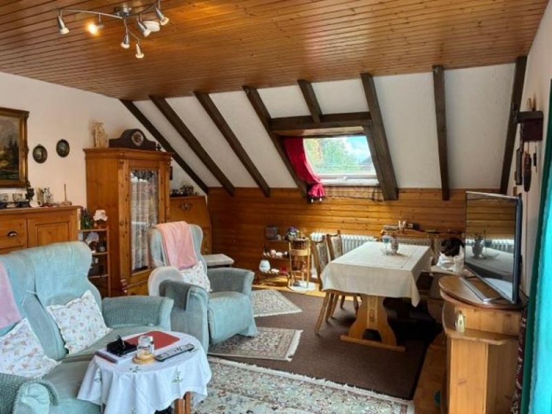 Häusern Stilvolle 2,5-Zimmer-Maisonettewohnung mit rustikalem Ambiente und viel Wohnqualität Wohnung kaufen
