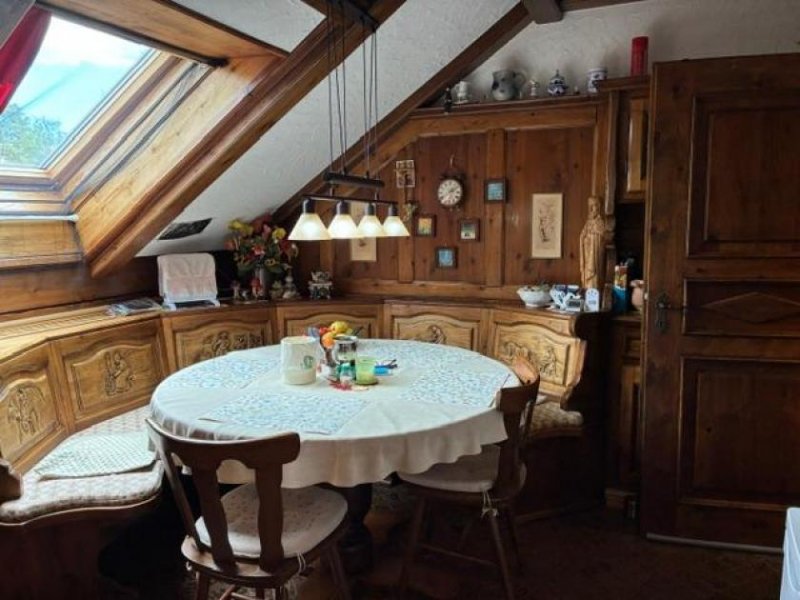 Häusern Stilvolle 2,5-Zimmer-Maisonettewohnung mit rustikalem Ambiente und viel Wohnqualität Wohnung kaufen