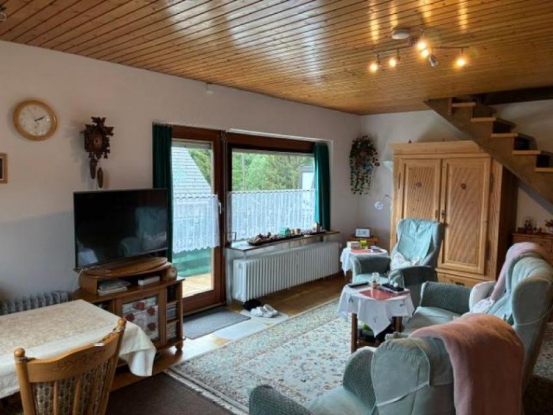 Häusern Stilvolle 2,5-Zimmer-Maisonettewohnung mit rustikalem Ambiente und viel Wohnqualität Wohnung kaufen