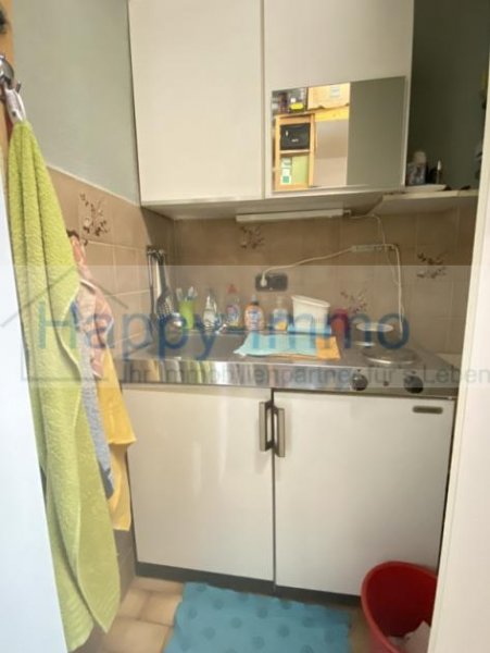 München mit Genehmigung für DG Ausbau als Wh bezugsfrei - 1 Zi-DG App und 1 Zimmer Gewerbeeinheit im EG Gewerbe kaufen