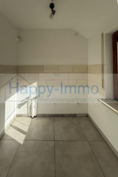 München bezugsfreie und renovierte Dachgeschosswohnung in ruhiger Innenhoflage Wohnung kaufen