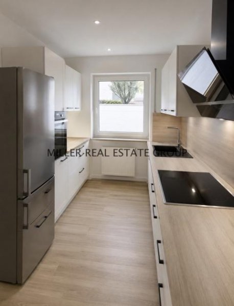 Ingolstadt Modernisiertes Reihenmittelhaus in Ingolstadt-Süd - Südwest-Garten, Terrasse & Garage! Haus kaufen