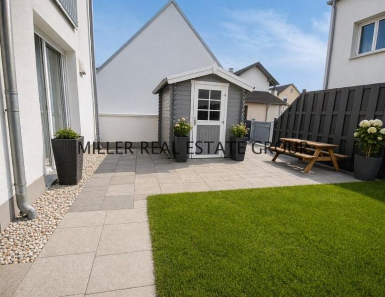 Kösching Moderne 4-Zimmer-Erdgeschosswohnung mit Privatgarten, Terrasse & zwei Tiefgaragenstellplätzen! Wohnung kaufen