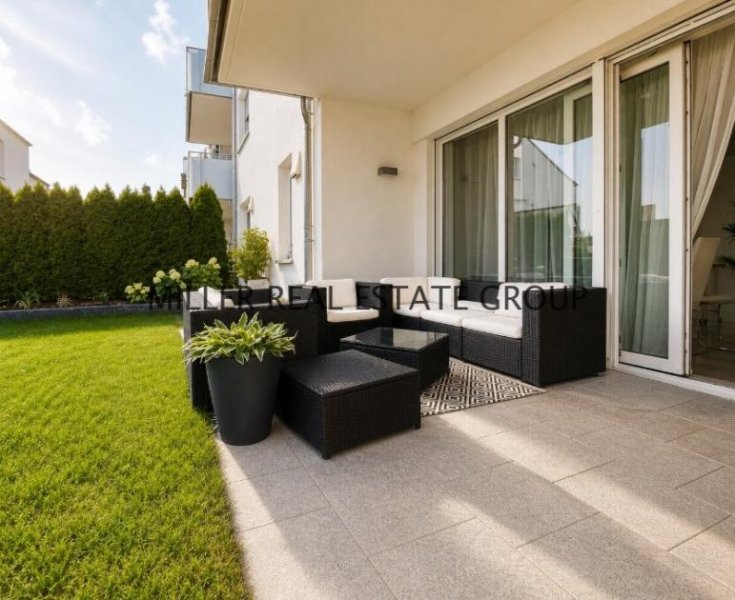 Kösching Moderne 4-Zimmer-Erdgeschosswohnung mit Privatgarten, Terrasse & zwei Tiefgaragenstellplätzen! Wohnung kaufen