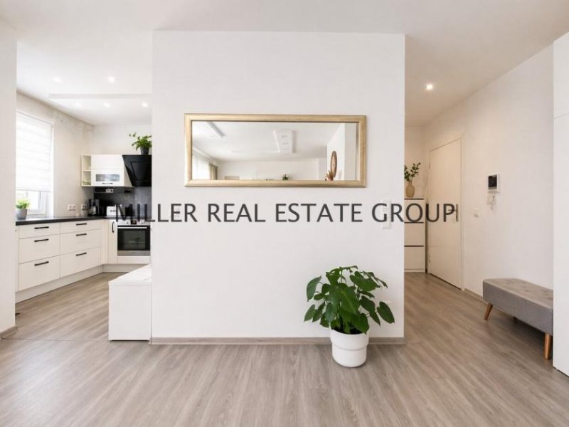 Kösching Moderne 4-Zimmer-Erdgeschosswohnung mit Privatgarten, Terrasse & zwei Tiefgaragenstellplätzen! Wohnung kaufen