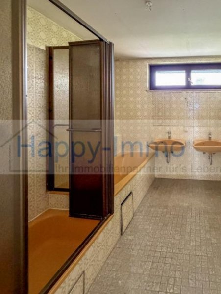 Kirchheim bei München Reihenhaus in ruhiger Lage in Kirchheim / 2 Garagen / bezugsfrei Haus kaufen